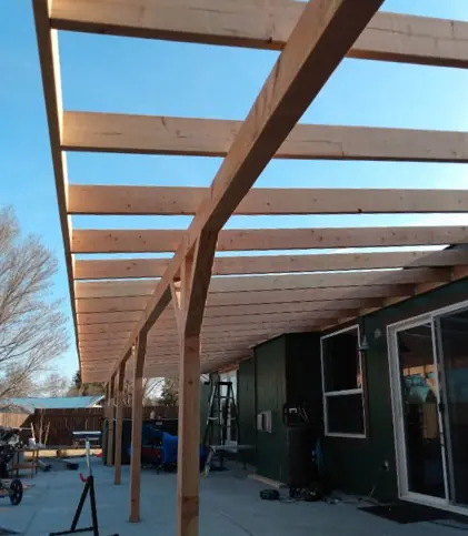 Custom-built residential awning with integrated skylights in Hermiston, Oregon